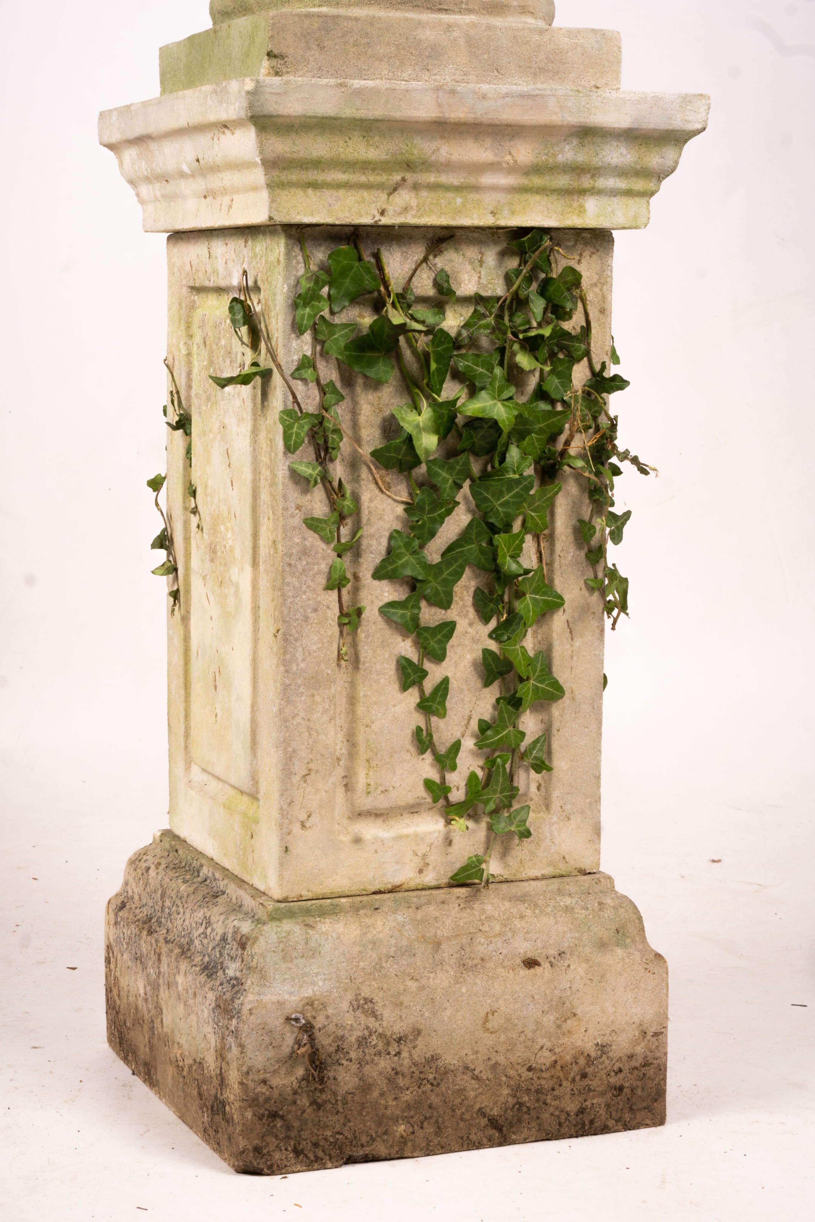 A reconstituted stone garden bird bath combined sundial on square pedestal base, height 108cm